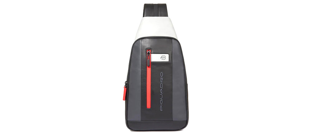 Bolso cruzado en piel marca Piquadro convertible en mochila