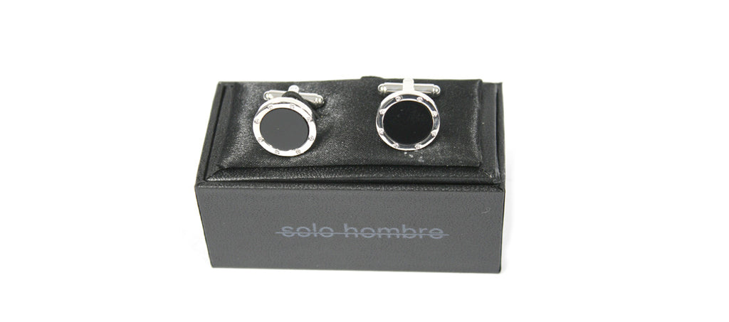 Gemelos redondos con remaches