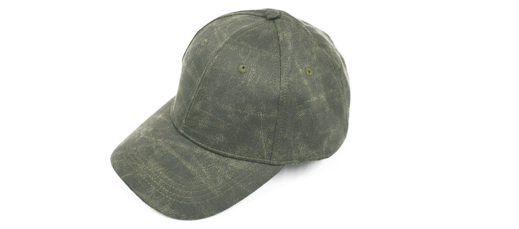 Gorra con visera impermeable de algodón encerado color verde militar