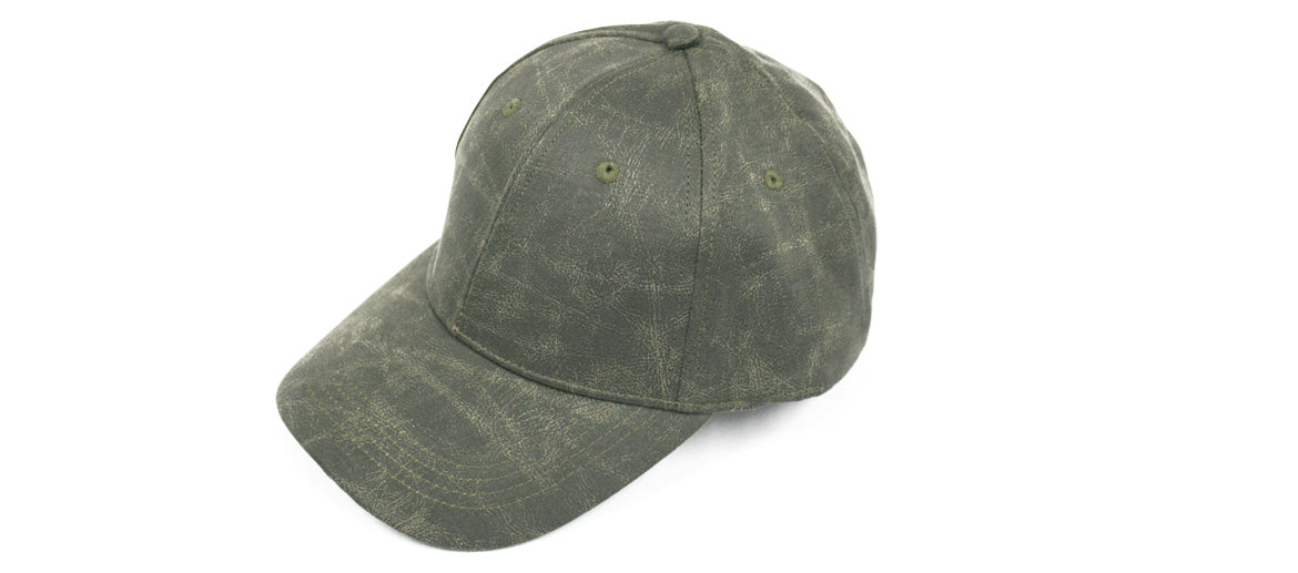 Gorra con visera impermeable de algodón encerado color verde militar