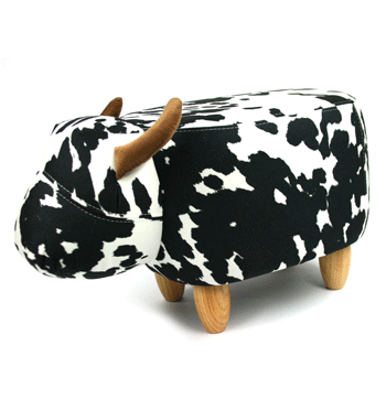 Puff banqueta para apoyar los pies con forma de vaca