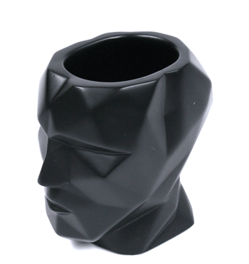 Bote de lapices con forma de cabeza humana color negro