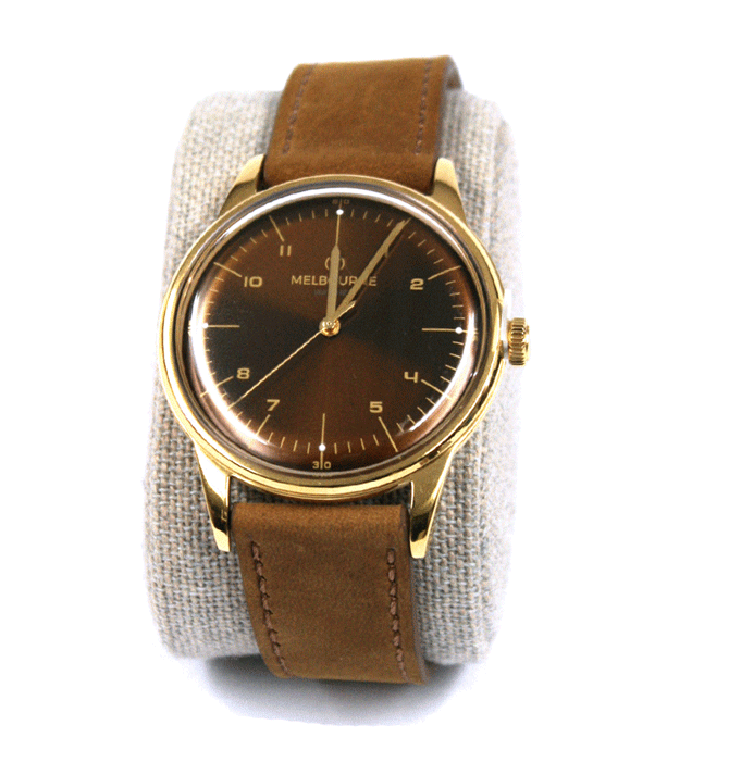 Reloj de pulsera dorado esfera marrón con correa de piel marca Melbourne